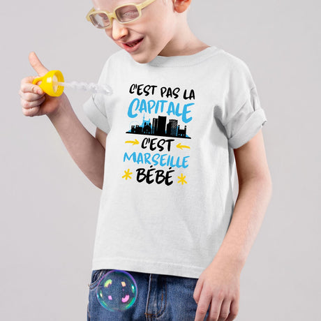 T-Shirt Enfant C'est pas la capitale c'est Marseille bébé Blanc